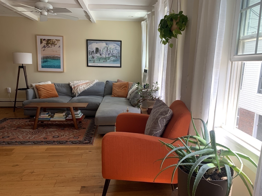 10 Salem St Avenue, Unit 2 Boston, MA 02129 - Photo 12 of 32 a living room with furniture and a window