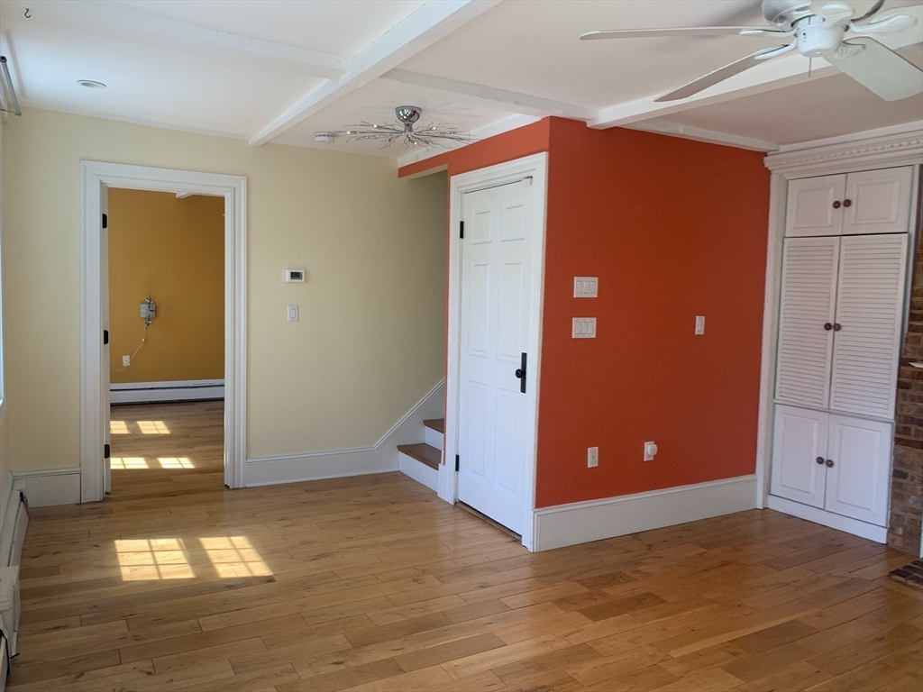 10 Salem St Avenue, Unit 2 Boston, MA 02129 - Photo 13 of 32 a view of a livingroom with wooden floor