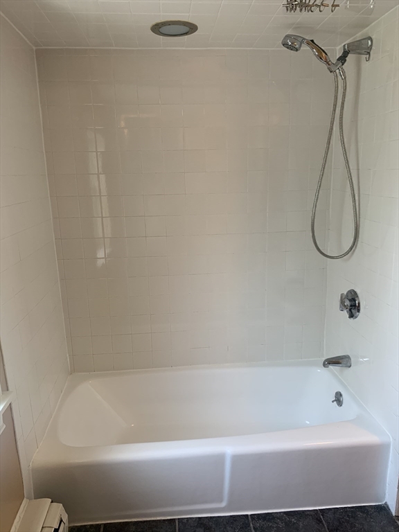 10 Salem St Avenue, Unit 2 Boston, MA 02129 - Photo 20 of 32 a bathroom with a bath tub with a shower