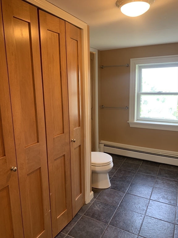 10 Salem St Avenue, Unit 2 Boston, MA 02129 - Photo 21 of 32 a bathroom with a toilet a sink and shower