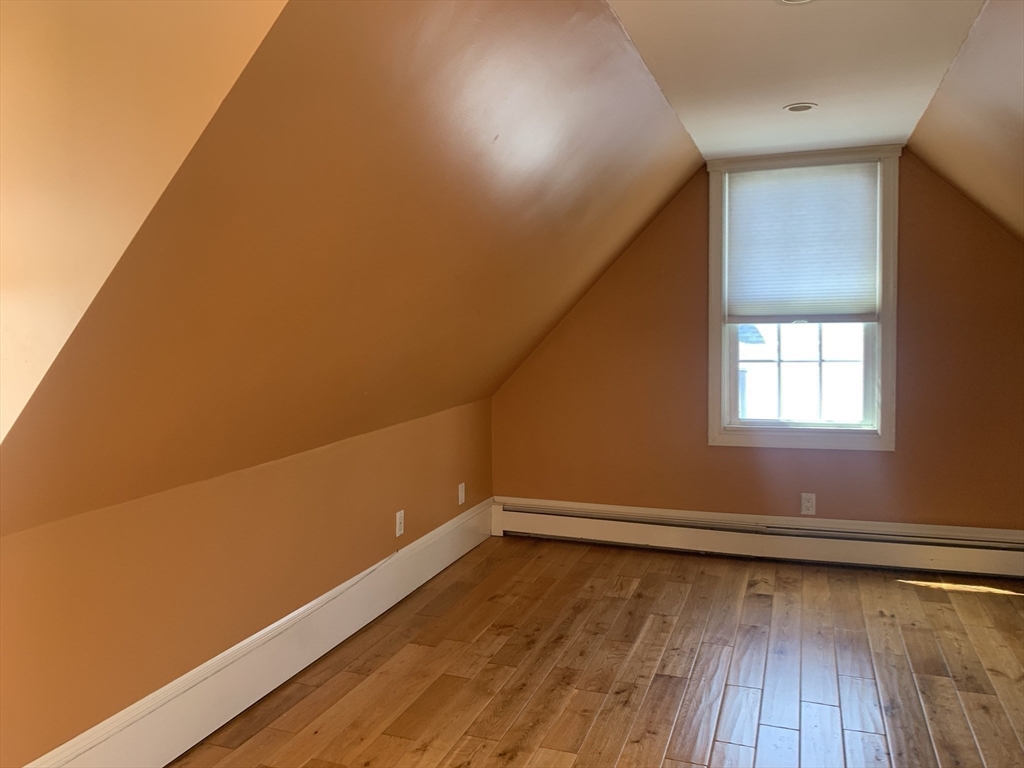 10 Salem St Avenue, Unit 2 Boston, MA 02129 - Photo 28 of 32 a view of a room with wooden floors and led lights