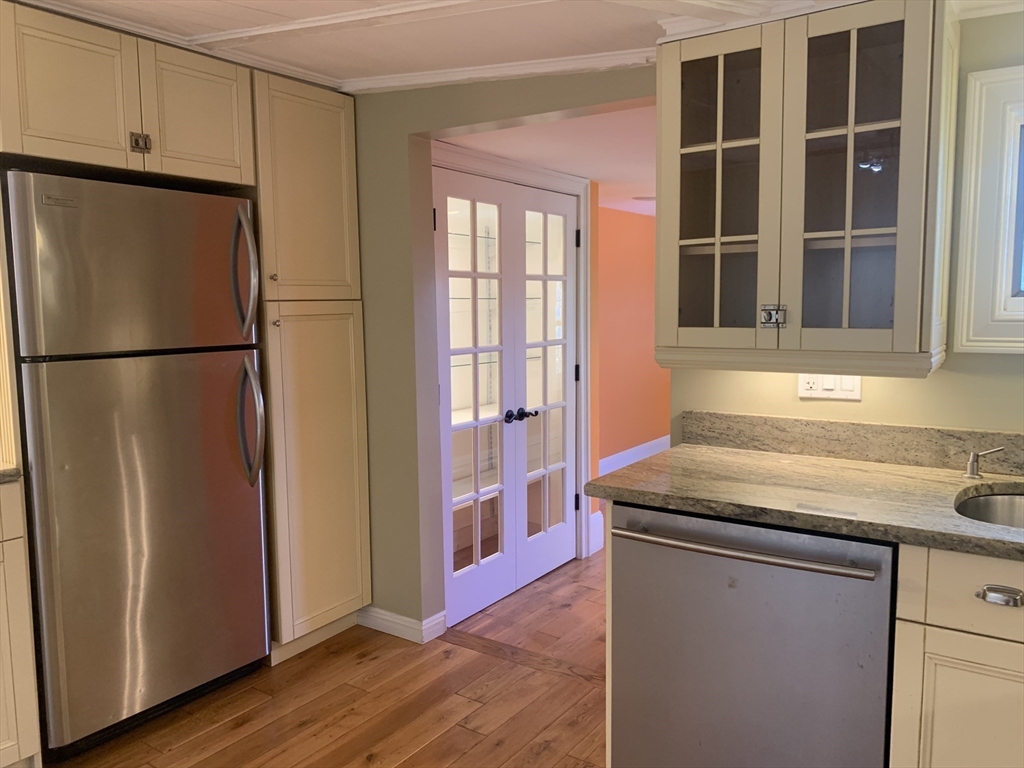 10 Salem St Avenue, Unit 2 Boston, MA 02129 - Photo 3 of 32 a kitchen with stainless steel appliances granite countertop a refrigerator and a sink