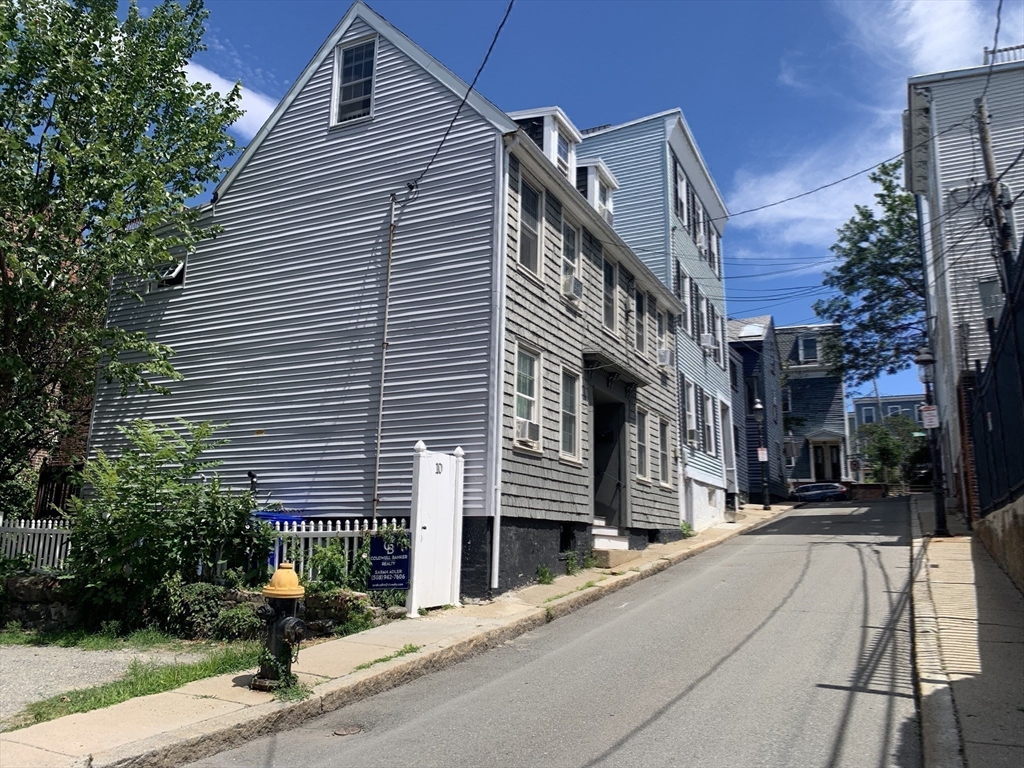 10 Salem St Avenue, Unit 2 Boston, MA 02129 - Photo 31 of 32 a brick building with a large windows
