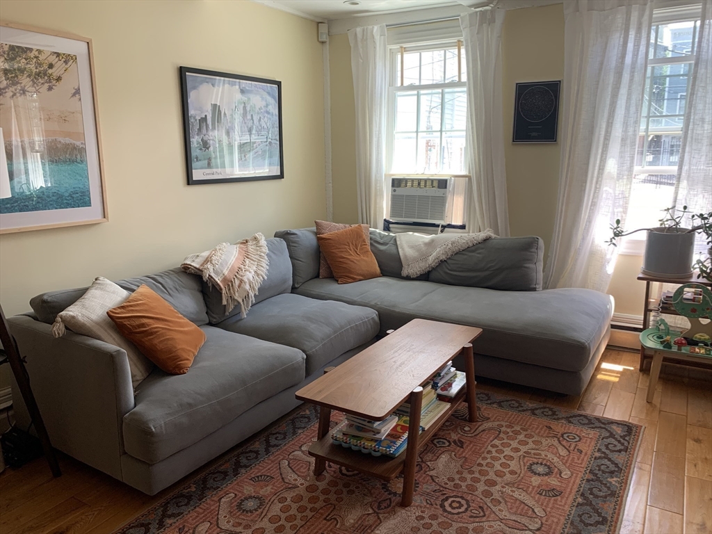 10 Salem St Avenue, Unit 2 Boston, MA 02129 - Photo 10 of 32 a living room with furniture a flat screen tv and a window