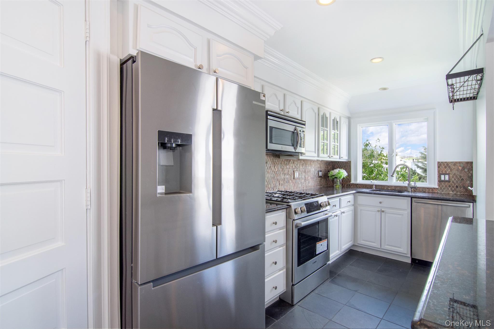 41 Sagamore Road Bronxville, NY 10708 - Photo 12 of 38 Open concept kitchen with new stainless steel appliances