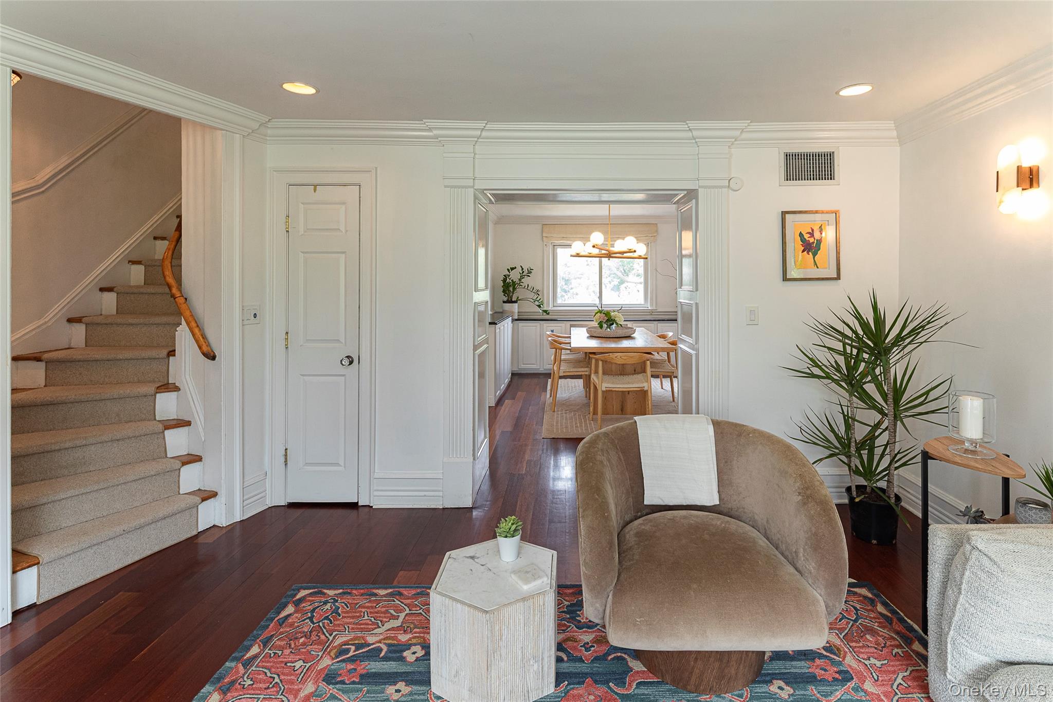 41 Sagamore Road Bronxville, NY 10708 - Photo 14 of 38 Living room with stairs, hardwood floors, ornamental molding, recessed lighting