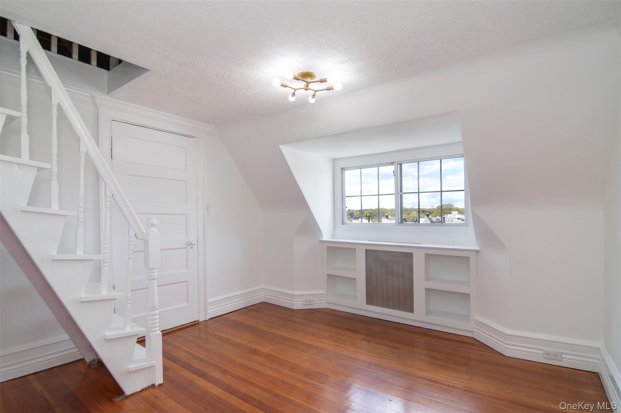 41 Sagamore Road Bronxville, NY 10708 - Photo 25 of 38 Fourth bedroom with stairs to attic play or storage space