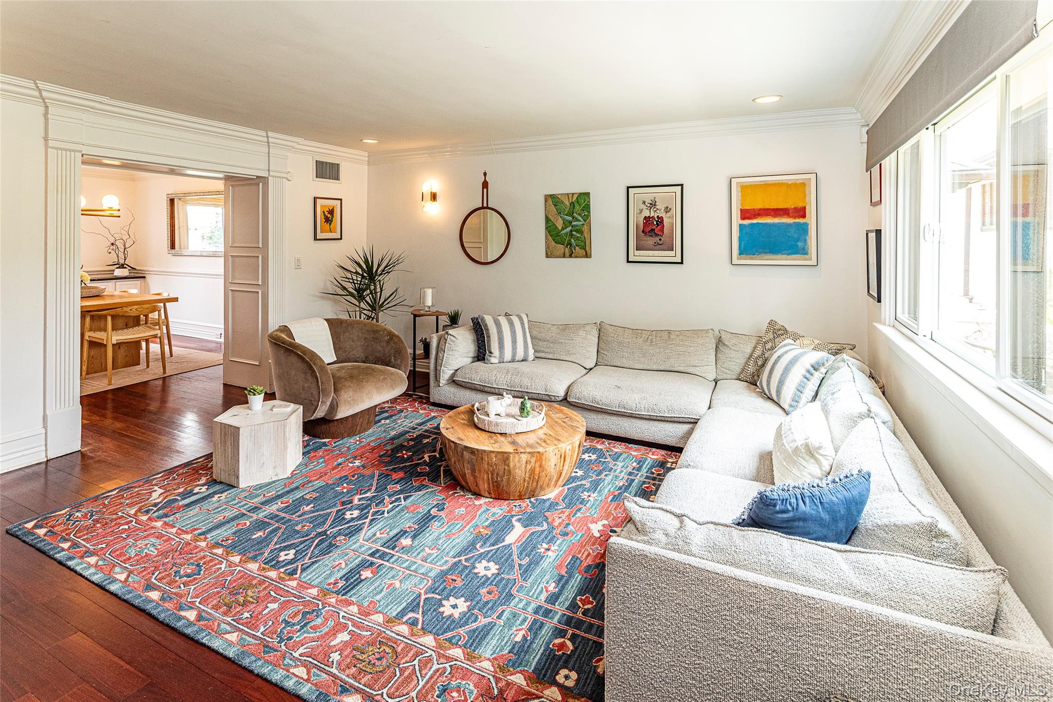 41 Sagamore Road Bronxville, NY 10708 - Photo 6 of 38 Living room with hardwood floors, ornamental molding, and recessed lighting