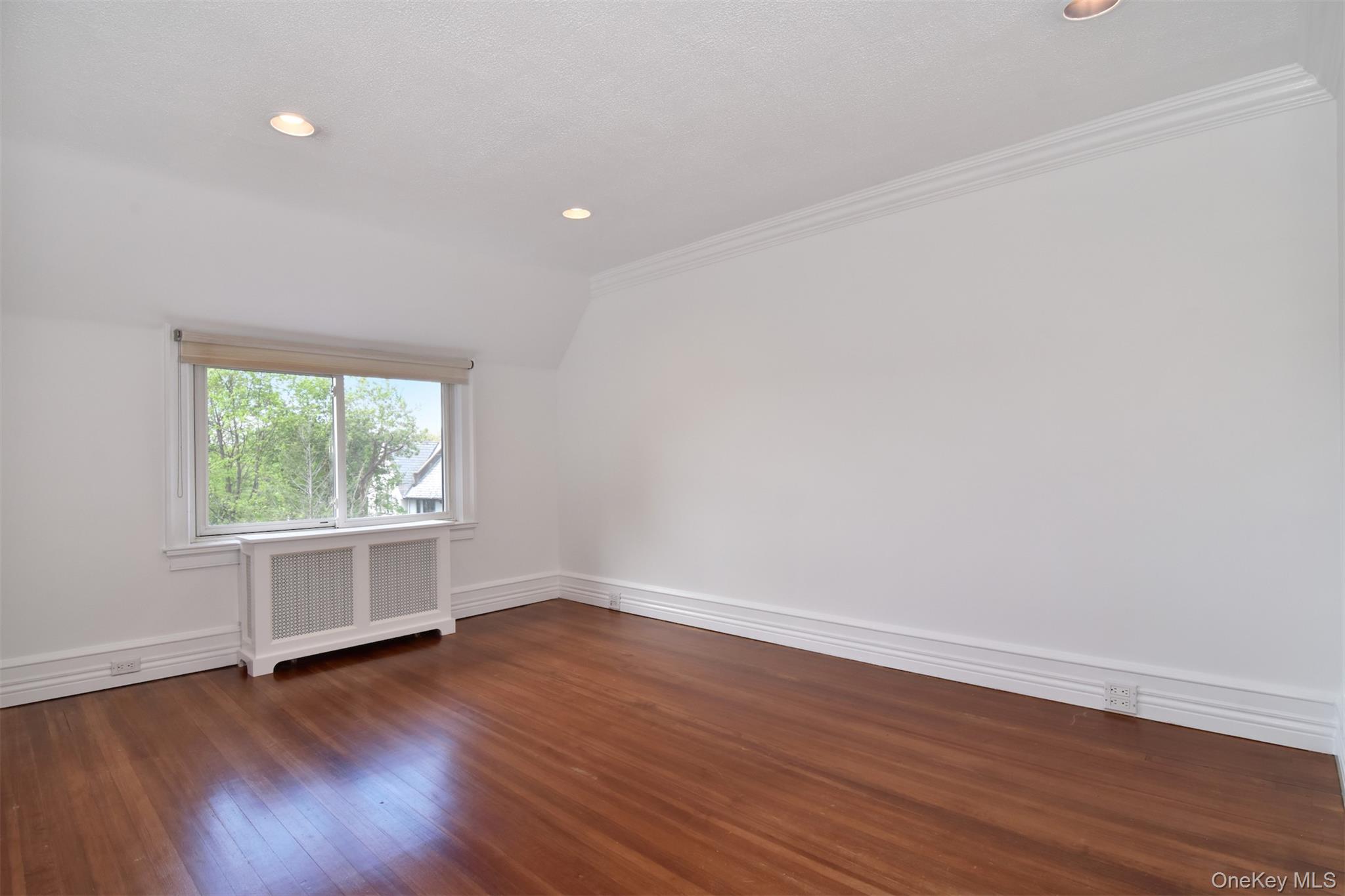 41 Sagamore Road Bronxville, NY 10708 - Photo 10 of 38 Dining room with ornamental molding and hardwood floors