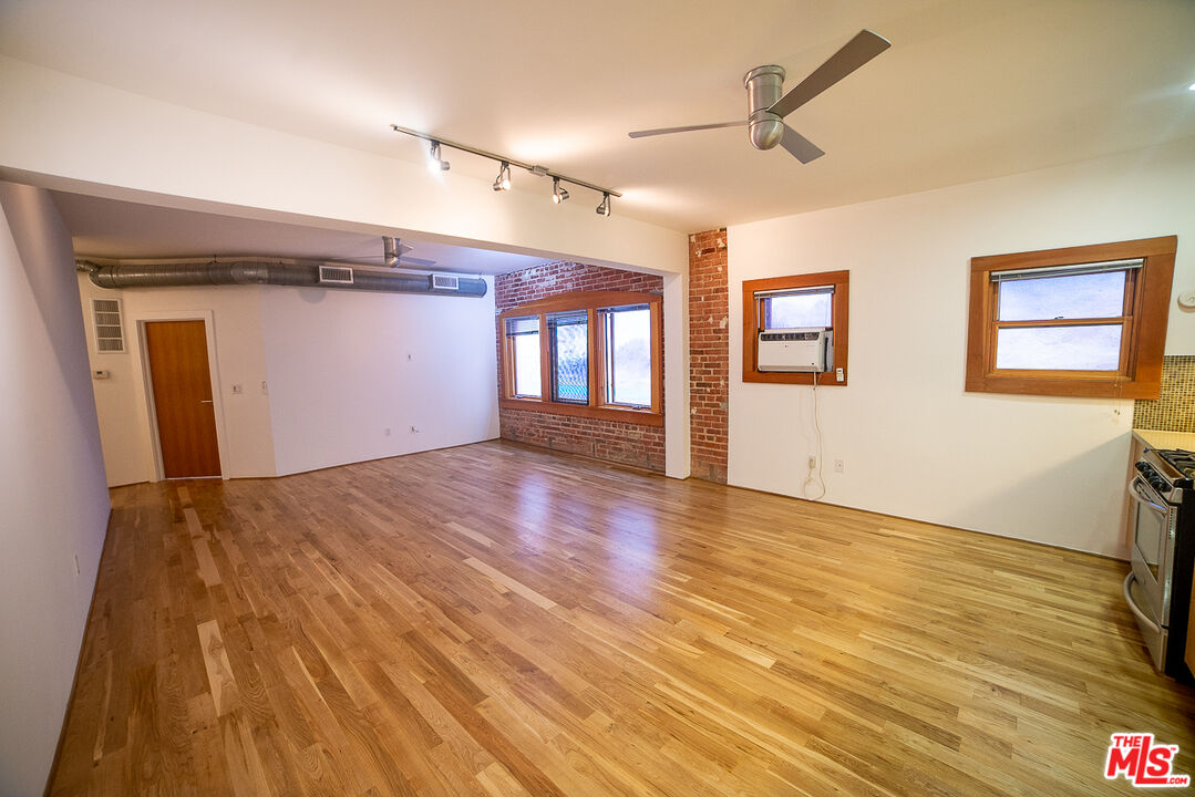 8 Brooks Avenue, Unit 10 Venice, CA 90291 - Photo 5 of 15 a view of empty room with wooden floor and fan