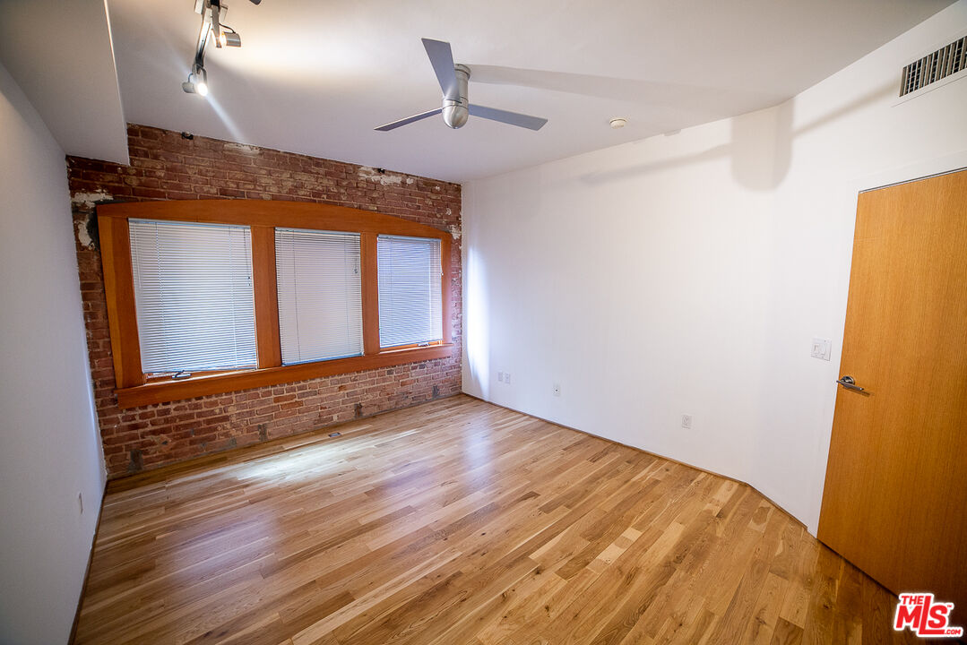8 Brooks Avenue, Unit 10 Venice, CA 90291 - Photo 8 of 15 a view of an empty room and wooden floor