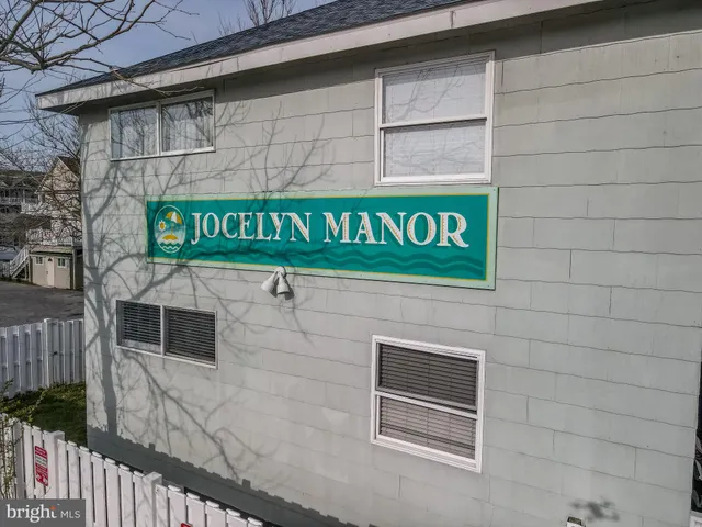 a signage on a brick wall