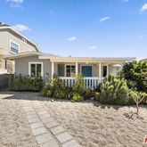 a view of backyard with a garden and plants
