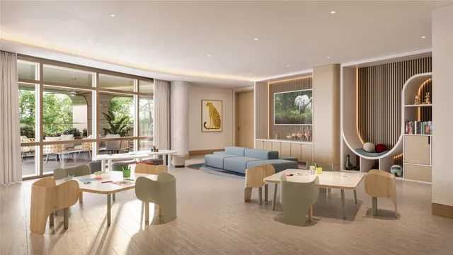 a living room with furniture and large windows