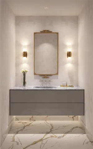 a bathroom with a sink and mirror