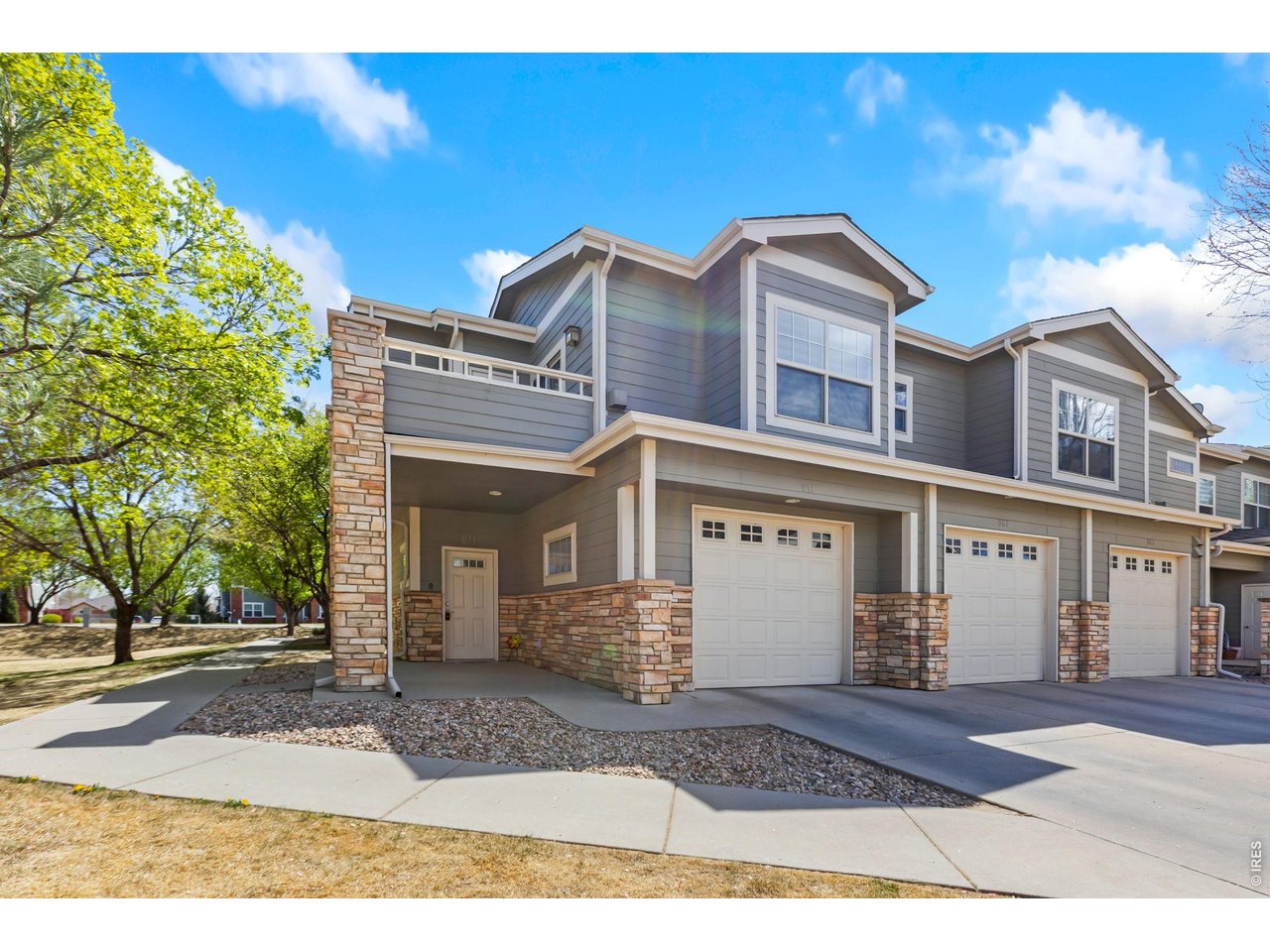 5775 29th Street, Unit 811 Greeley, CO 80634 - Photo 1 of 21 a front view of a house