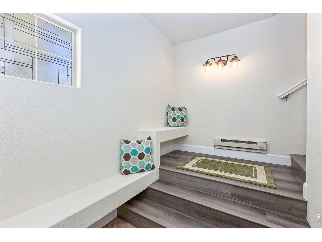 5775 29th Street, Unit 811 Greeley, CO 80634 - Photo 18 of 21 a view of an entryway with wooden floor