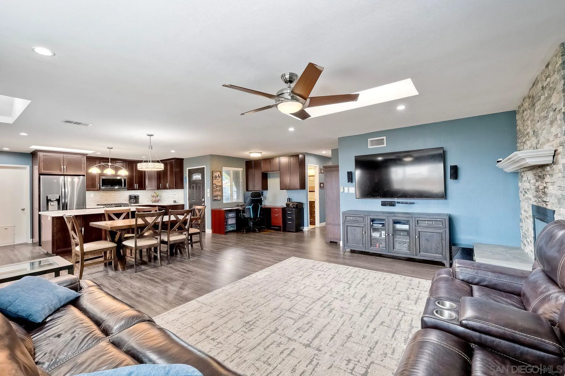 10421 Len Street Santee, CA 92071 - Photo 11 of 34 a living room with furniture and a flat screen tv