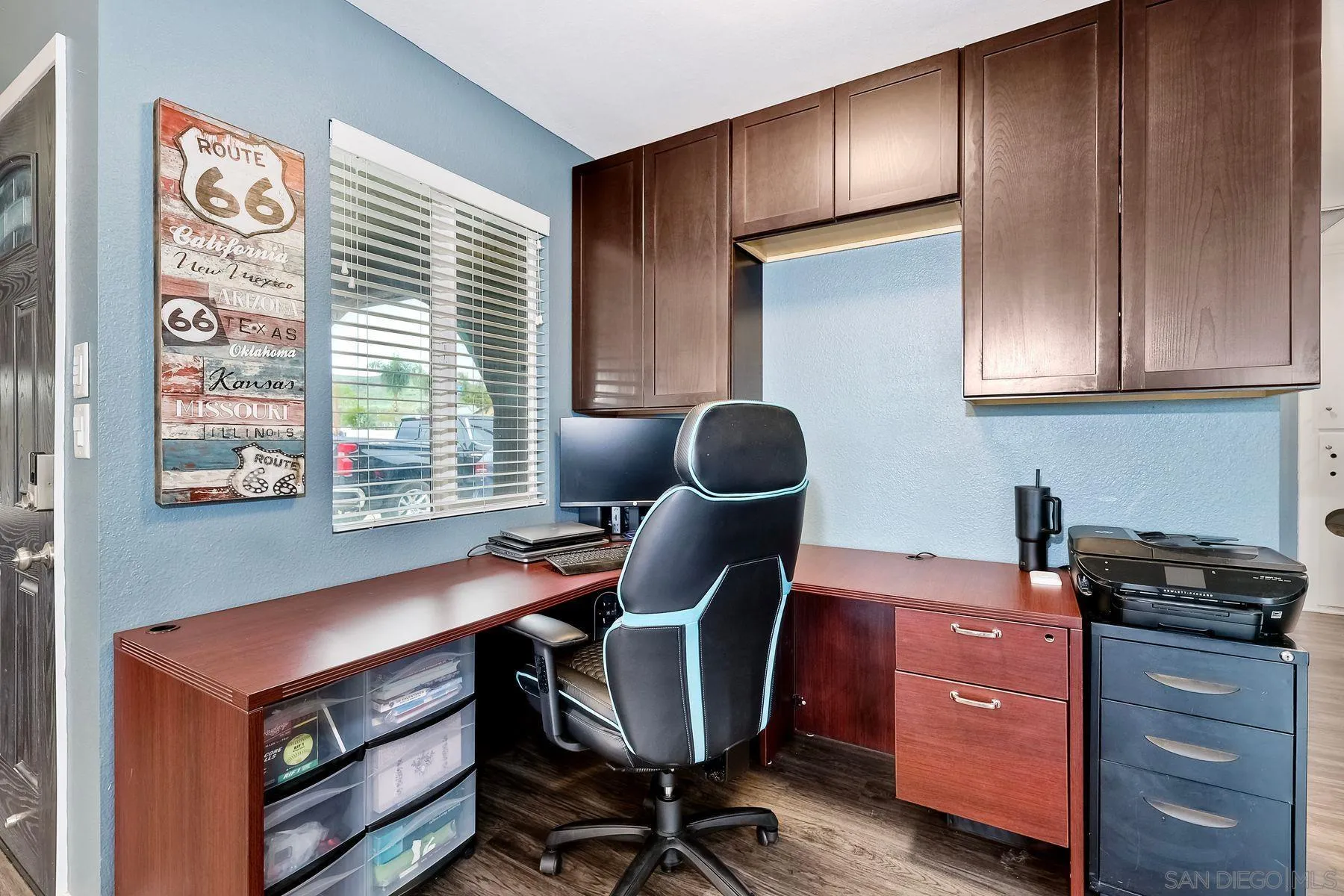 10421 Len Street Santee, CA 92071 - Photo 12 of 34 a view of a workspace with furniture and a window