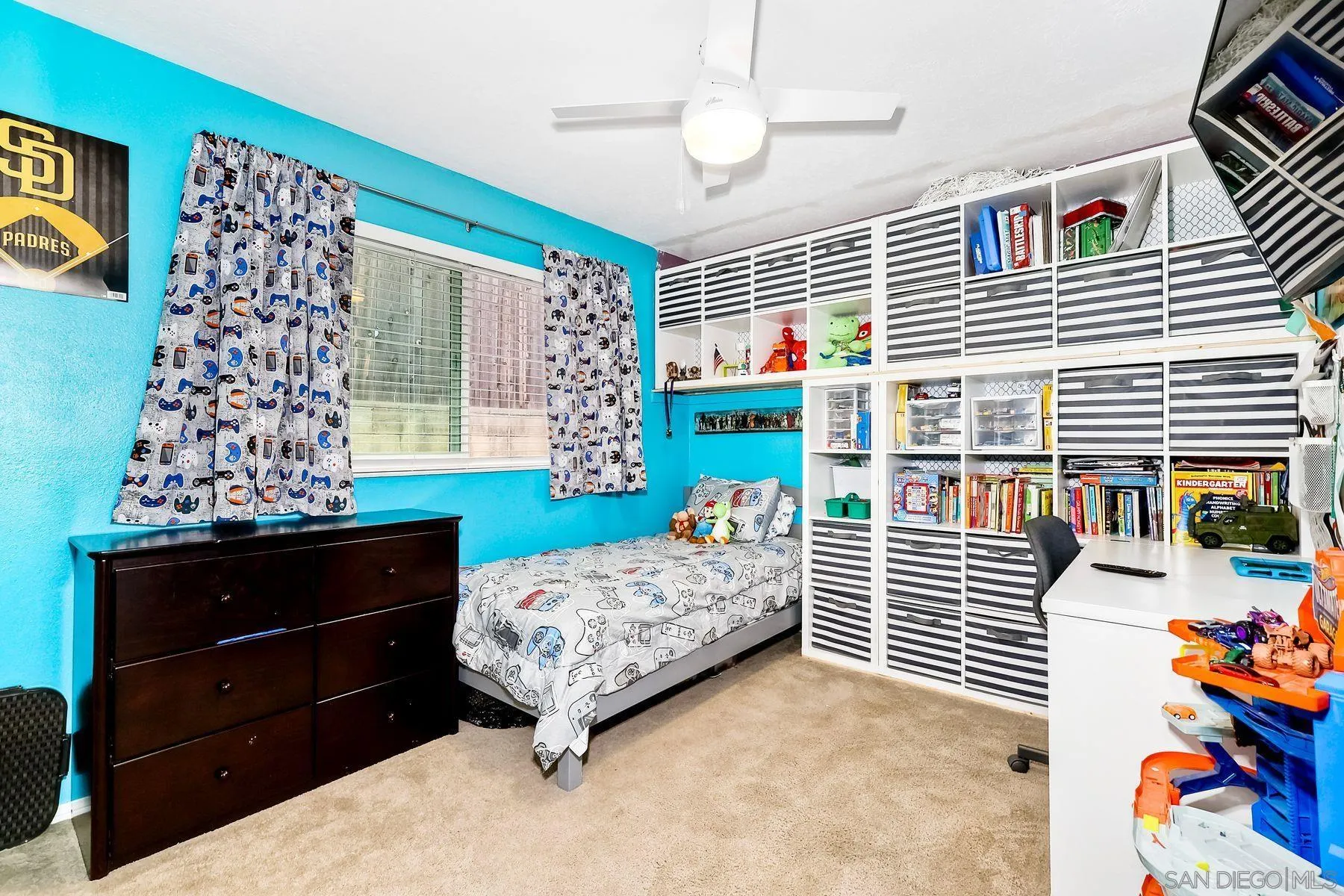 10421 Len Street Santee, CA 92071 - Photo 21 of 34 a bedroom with a bed and a window