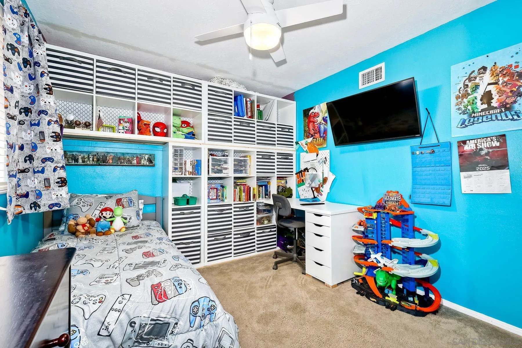 10421 Len Street Santee, CA 92071 - Photo 22 of 34 a bedroom with furniture and a flat screen tv