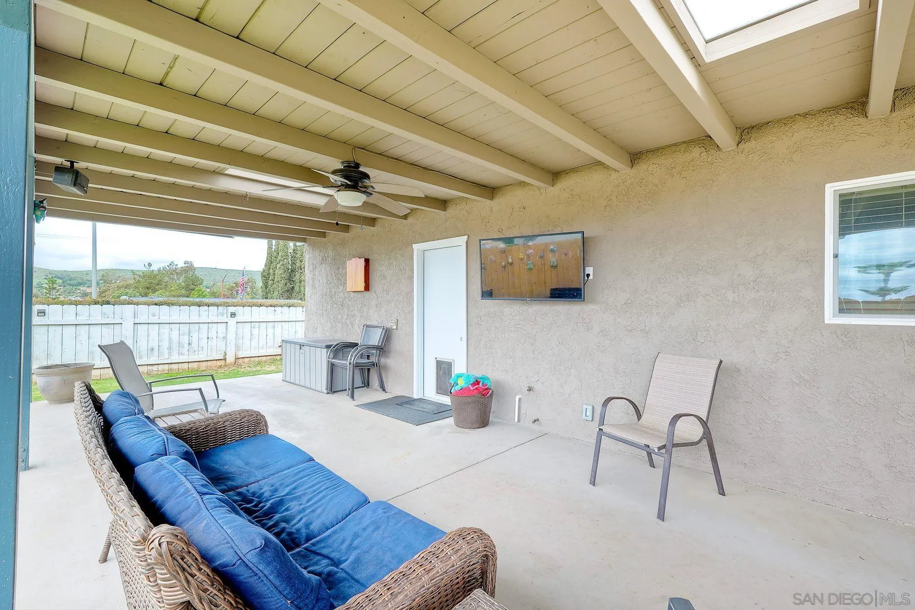 10421 Len Street Santee, CA 92071 - Photo 24 of 34 a living room with furniture and a floor to ceiling window