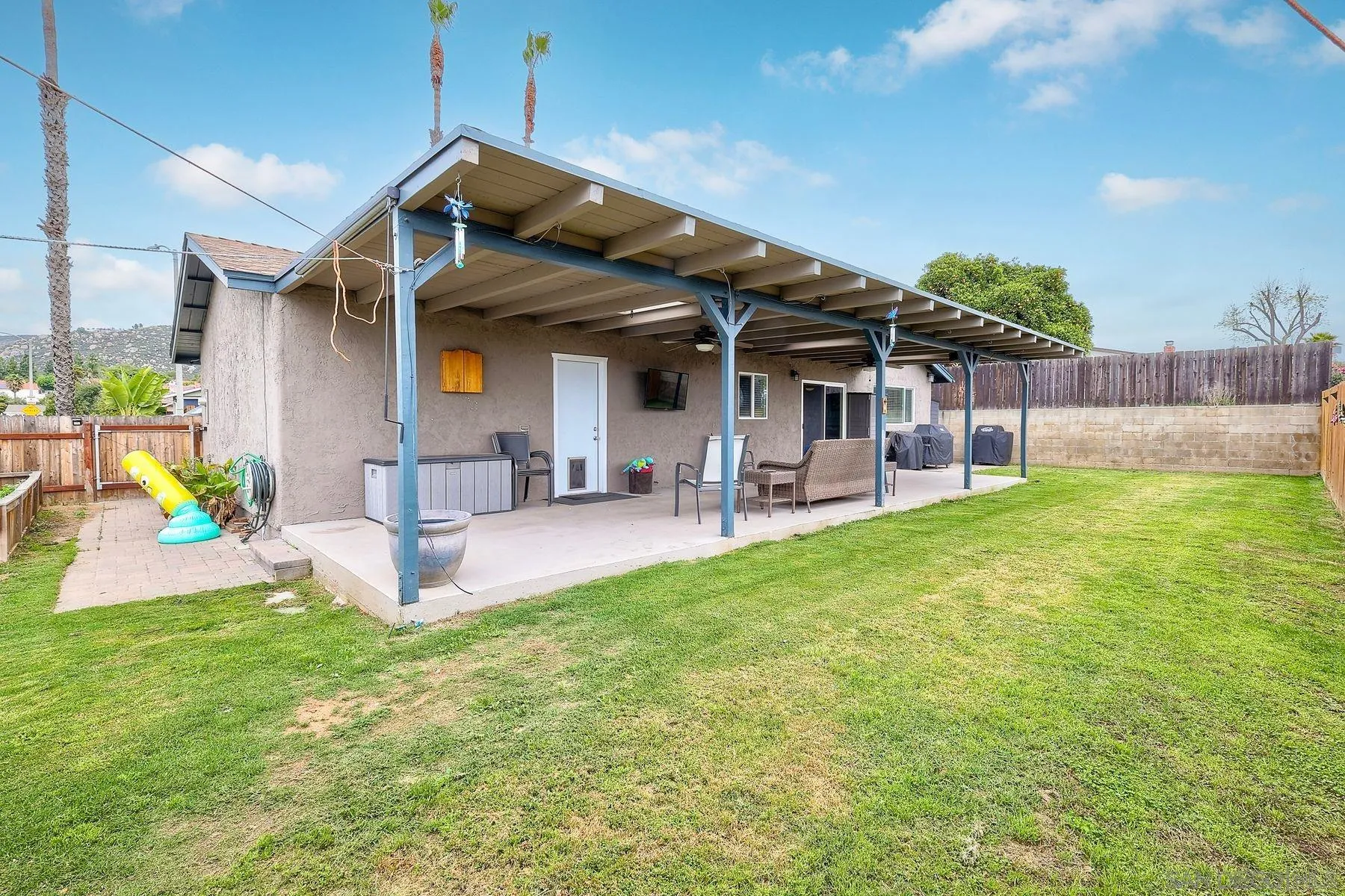 10421 Len Street Santee, CA 92071 - Photo 27 of 34 a view of a backyard with a patio
