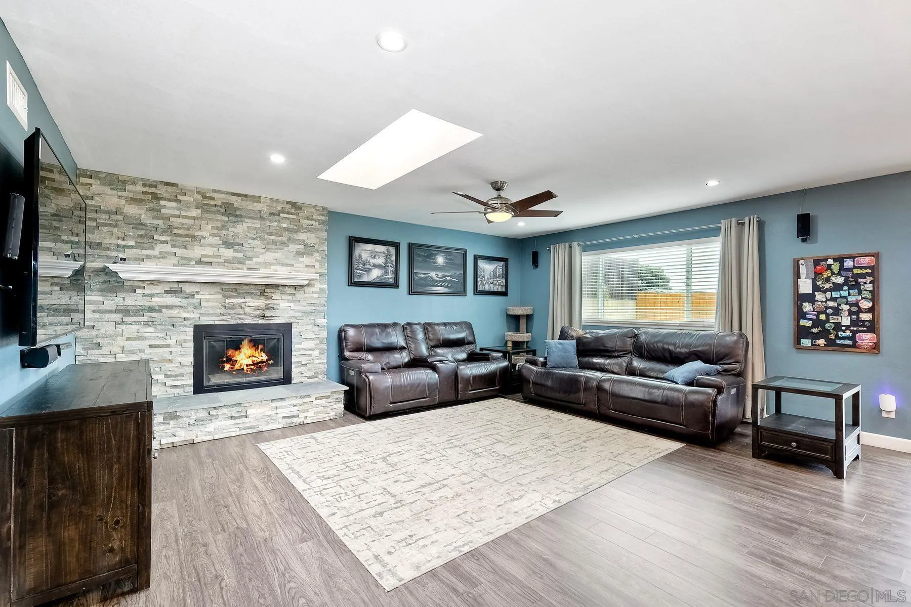 10421 Len Street Santee, CA 92071 - Photo 6 of 34 a living room with furniture and a fireplace