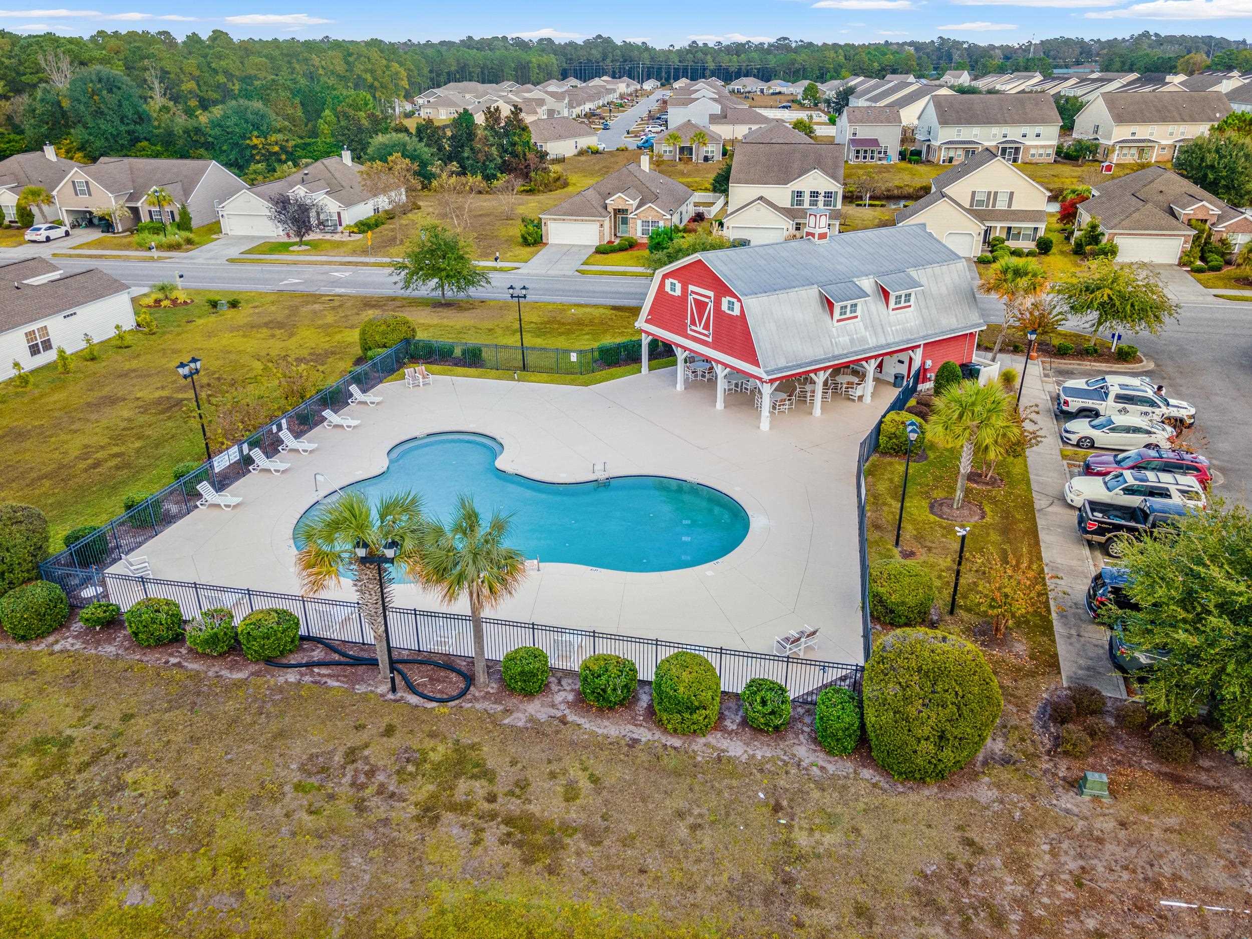 2487 Windmill Way Myrtle Beach, SC 29579 - Photo 39 of 40 Community pool with a residential view and a patio