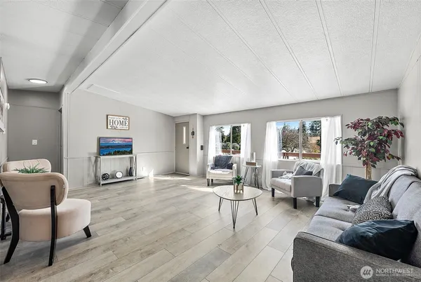 a living room with furniture and a couch