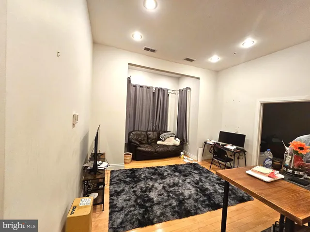 a bed room with a bed and furniture