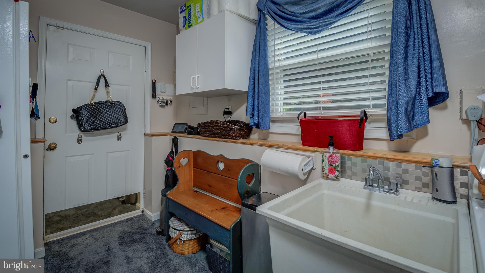 222 Choptank Road Stafford, VA 22556 - Photo 33 of 39 LAUNDRY AREA LEADING TO GARAGE!!!