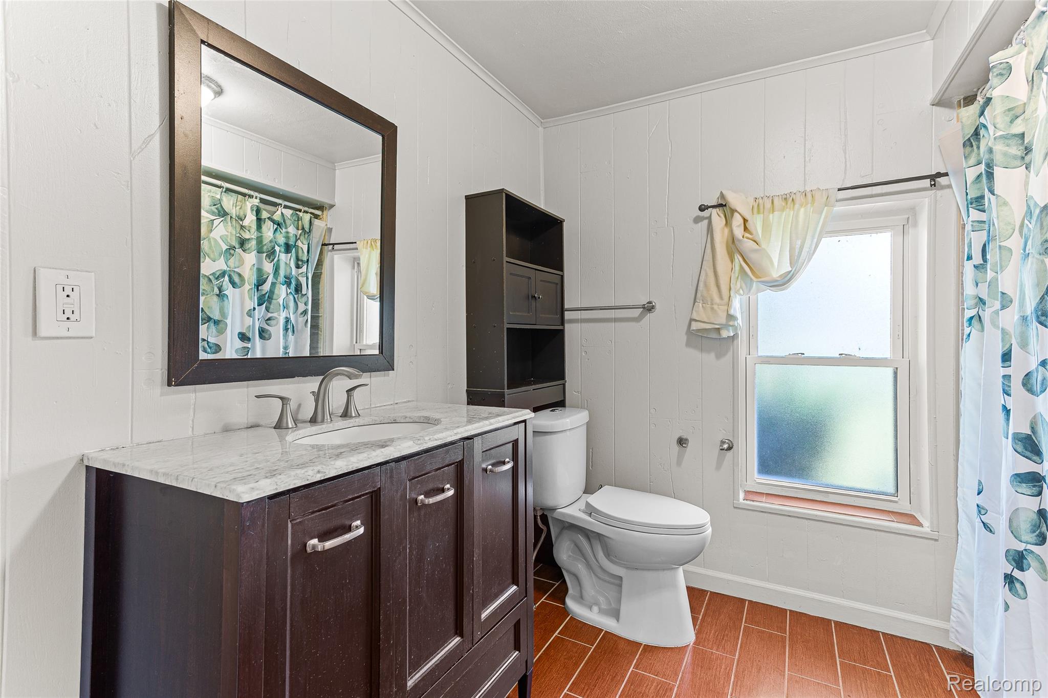 2550 Loon Lake Road Wixom, MI 48393 - Photo 21 of 36 Vanity with a light-toned countertop, rectangular undermount sink, and brushed nickel faucet