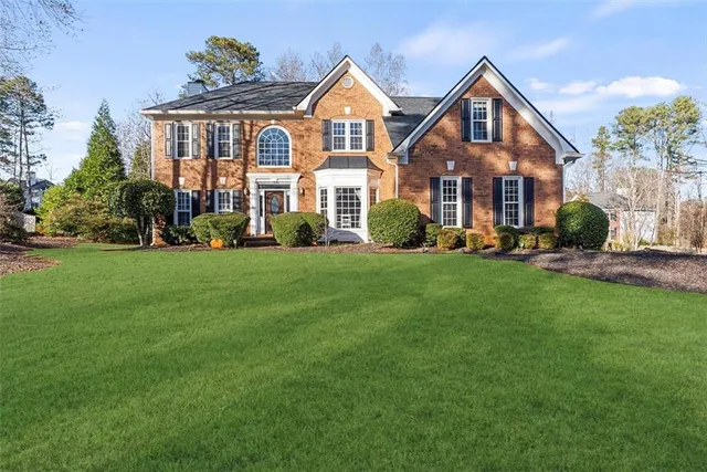 a workspace with furniture gym equipment and a chandelier