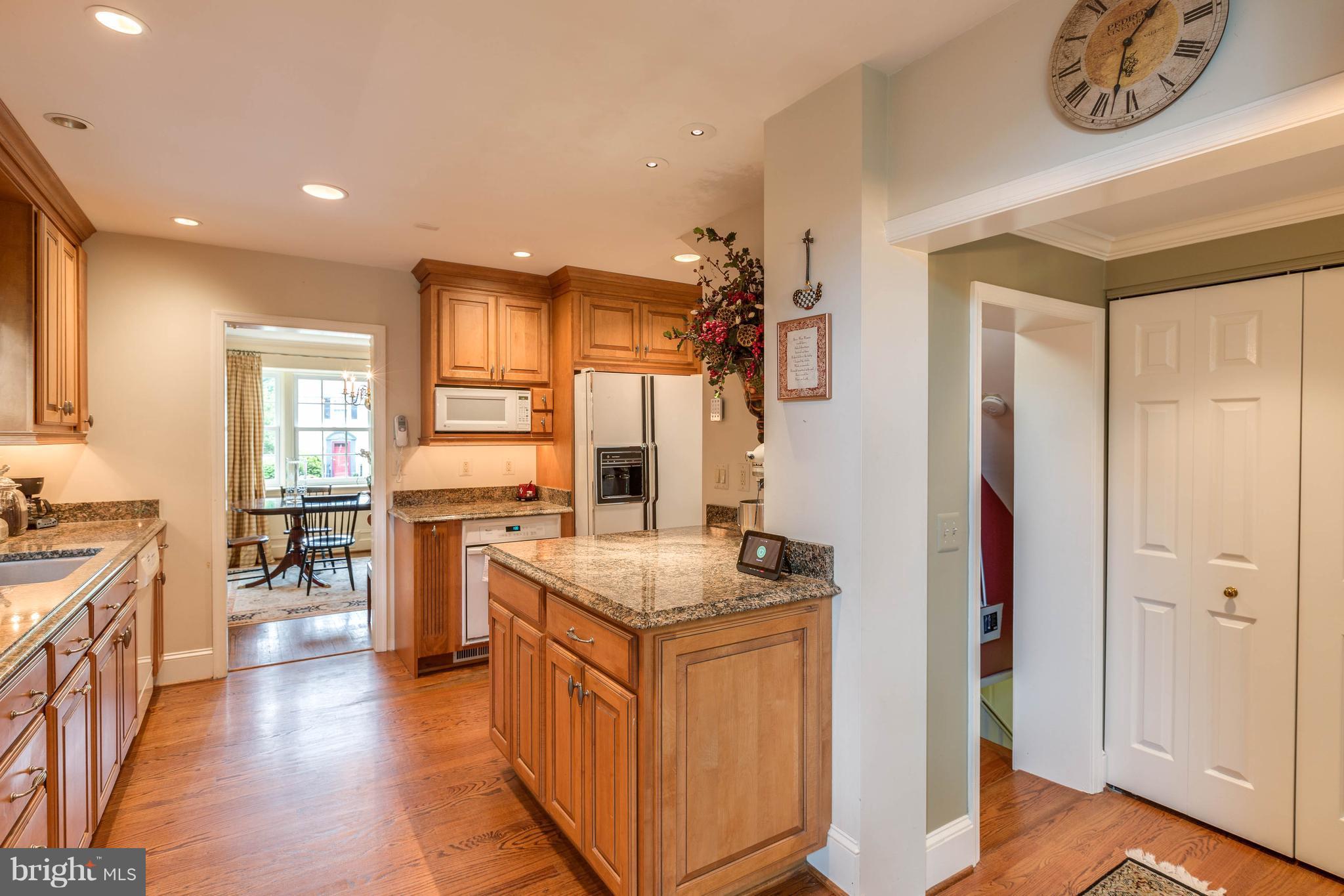 704 Sussex Road Baltimore, MD 21286 - Photo 8 of 30 Kitchen has beautiful hardwood flooring.