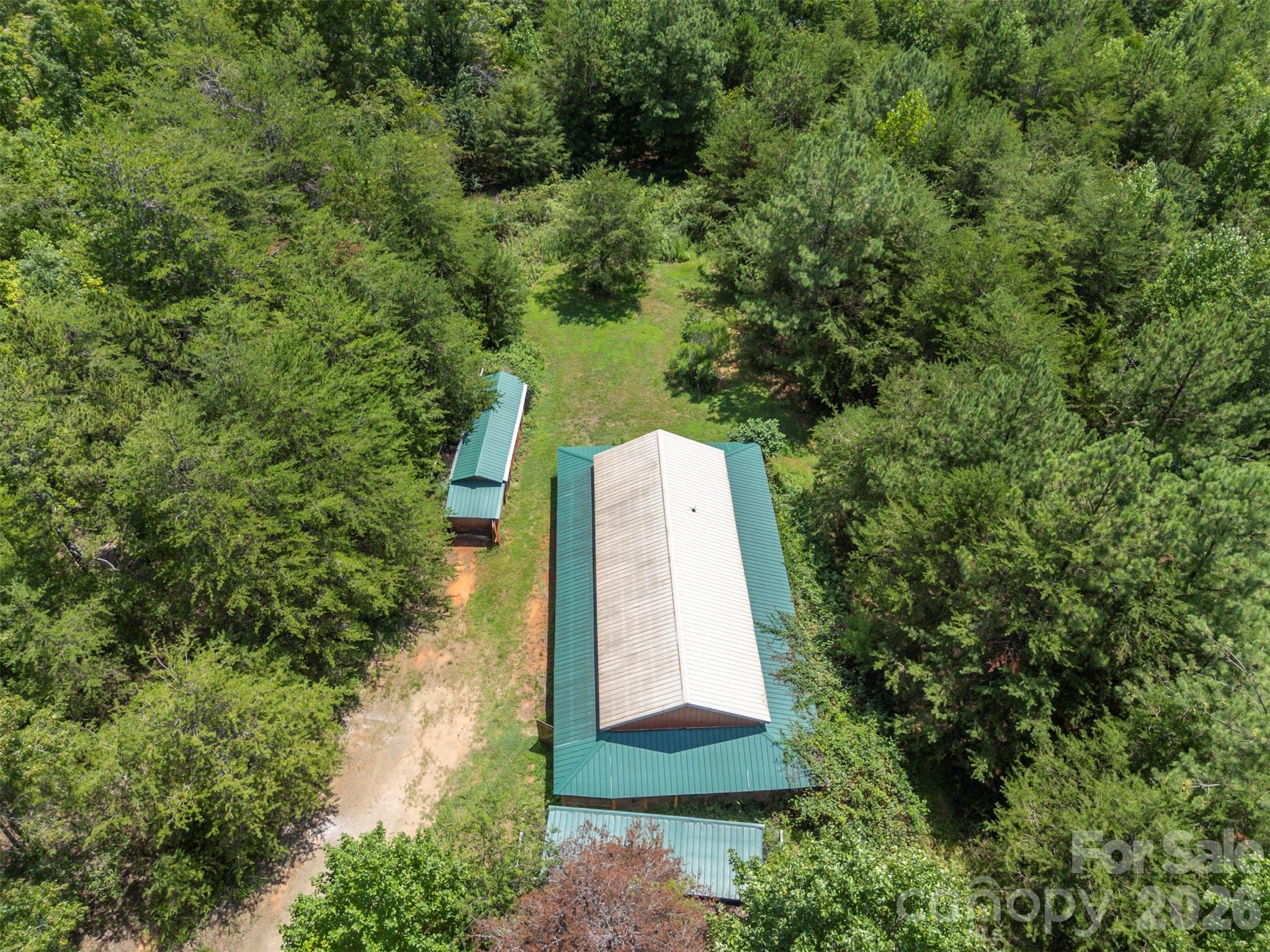 340 Right Prong Road Ellenboro, NC 28040 - Photo 23 of 28 a view of a yard with plants