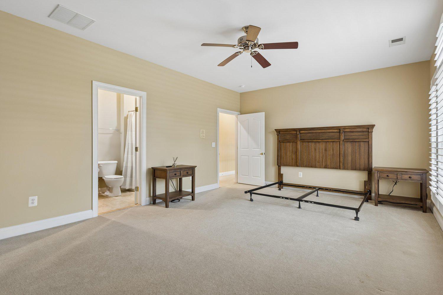 313 Wye Road Queenstown, MD 21658 - Photo 81 of 132 Spacious bedroom suite with warm, inviting tones.