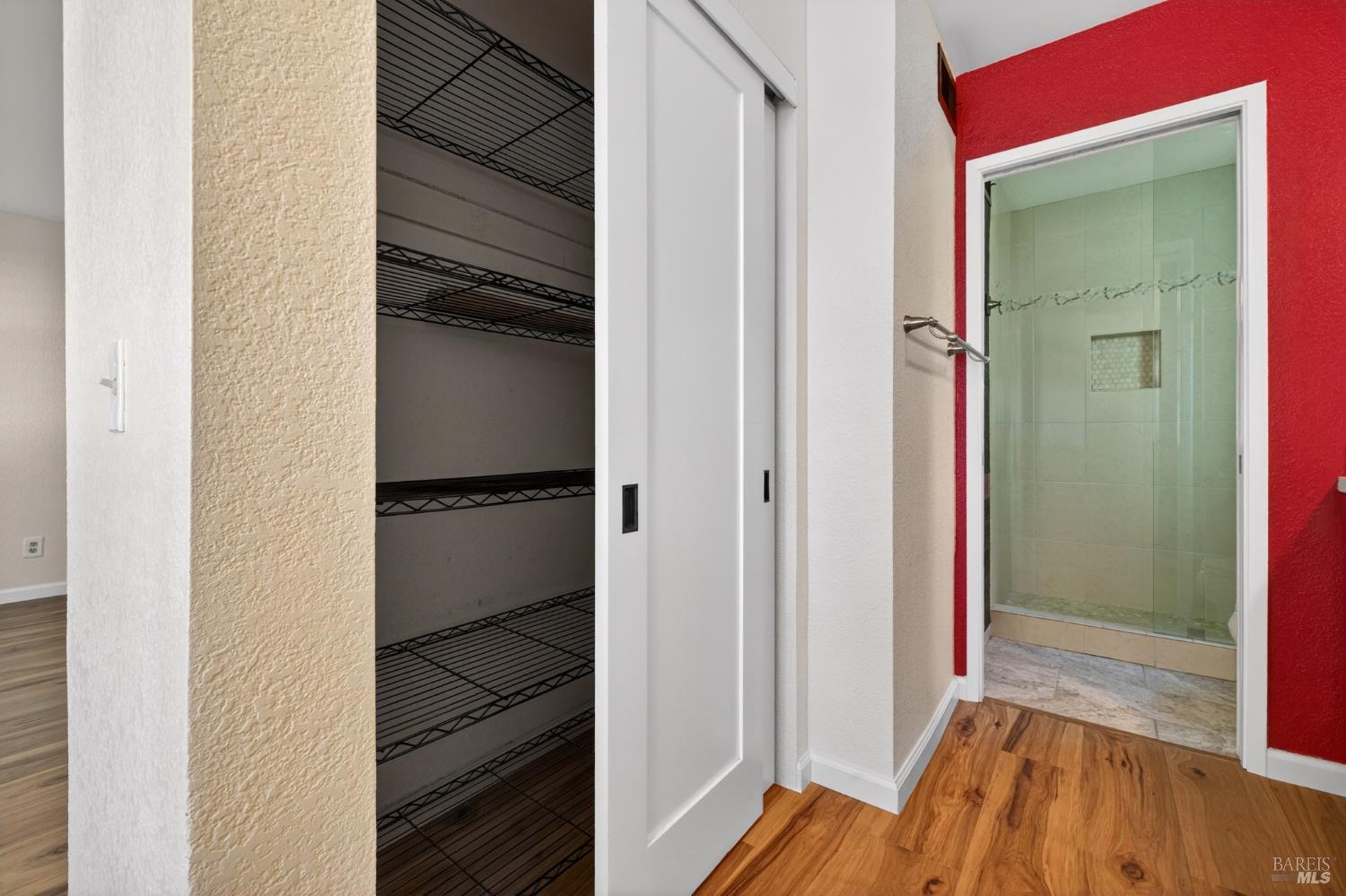 2757 Lakeview Drive Santa Rosa, CA 95405 - Photo 23 of 54 a view of walk in closet with wooden floor