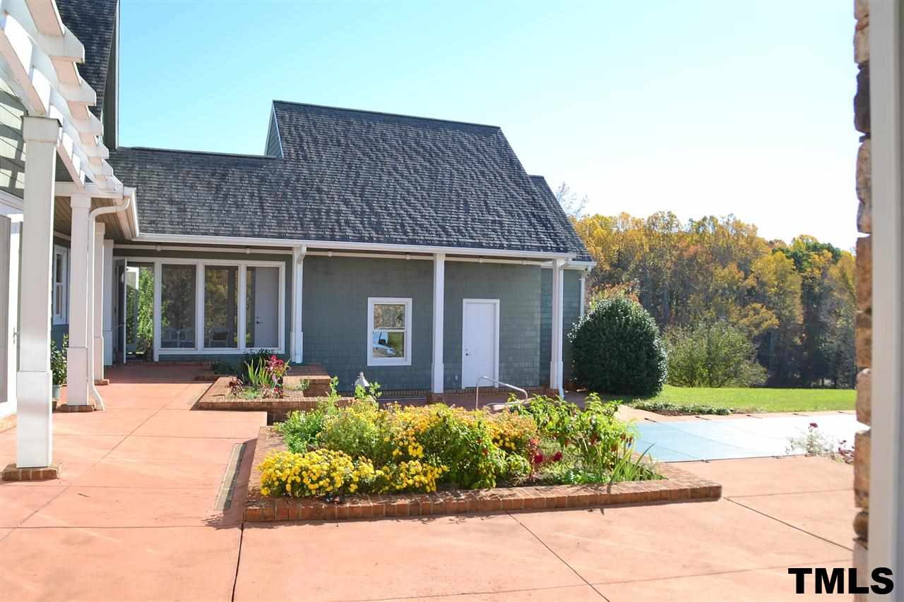 7411 Bill Poole Road Rougemont, NC 27572 - Photo 18 of 25 Tiered Patio & Garden Beds.