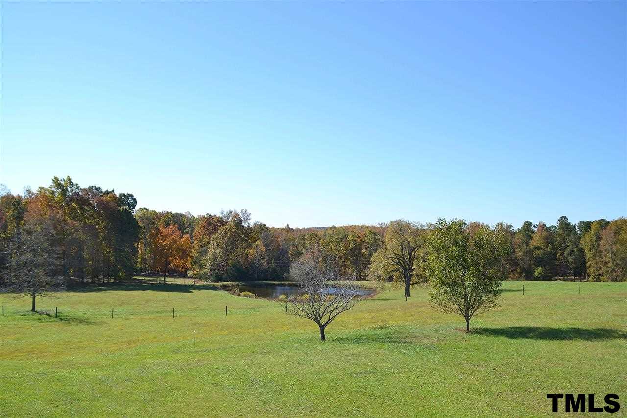 7411 Bill Poole Road Rougemont, NC 27572 - Photo 21 of 25 View of Property & Pond from the Master Sitting Room.