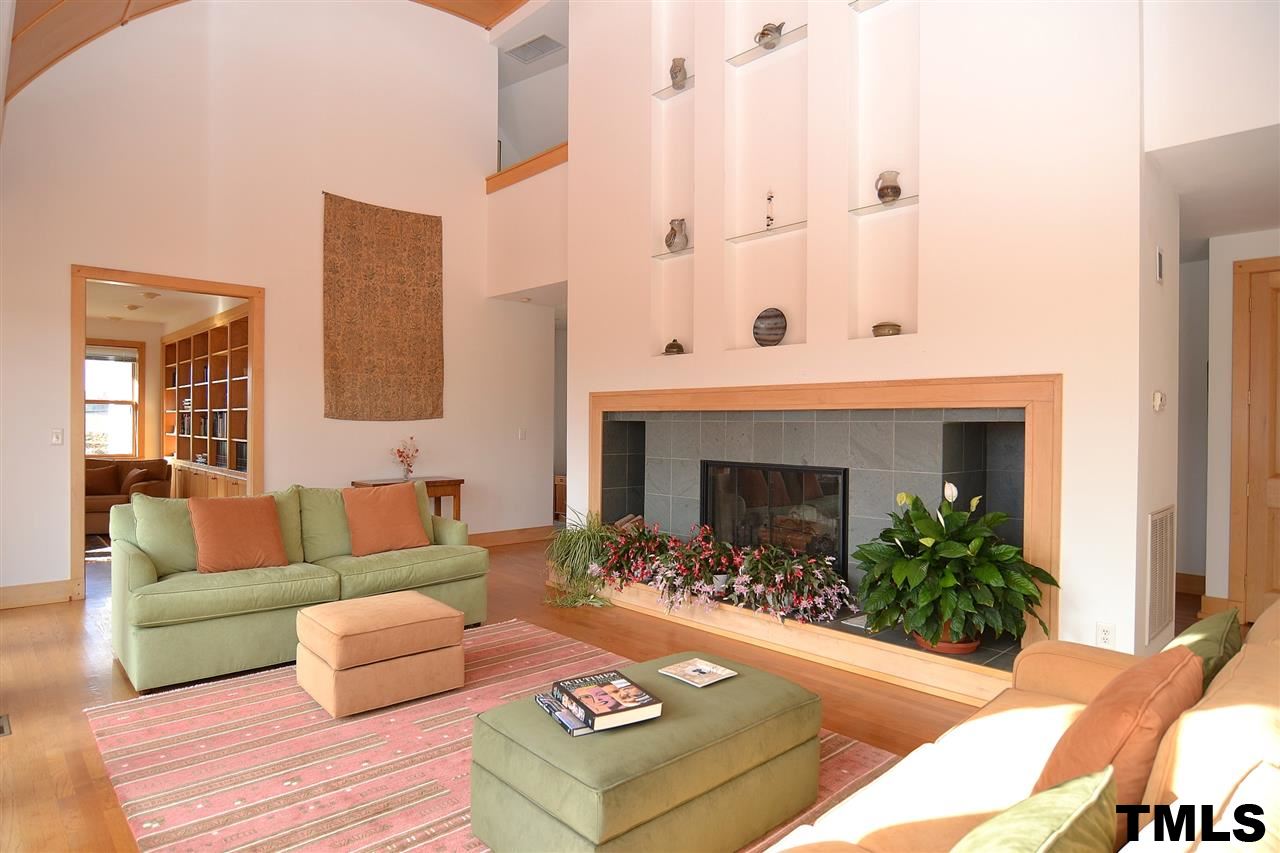 7411 Bill Poole Road Rougemont, NC 27572 - Photo 5 of 25 Slate Fireplace & Feature Wall w/ Glass Shelving.