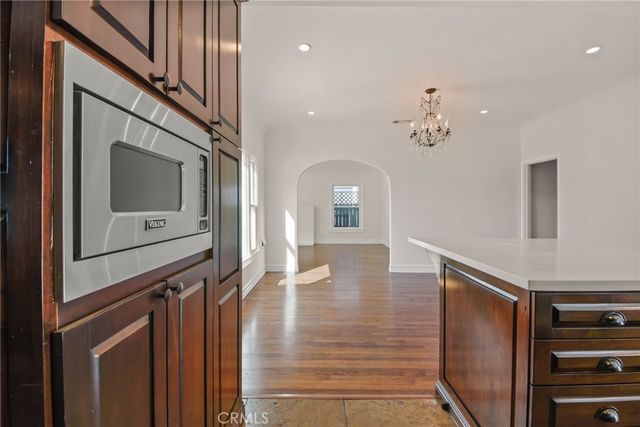 a view of a storage & utility room with a door