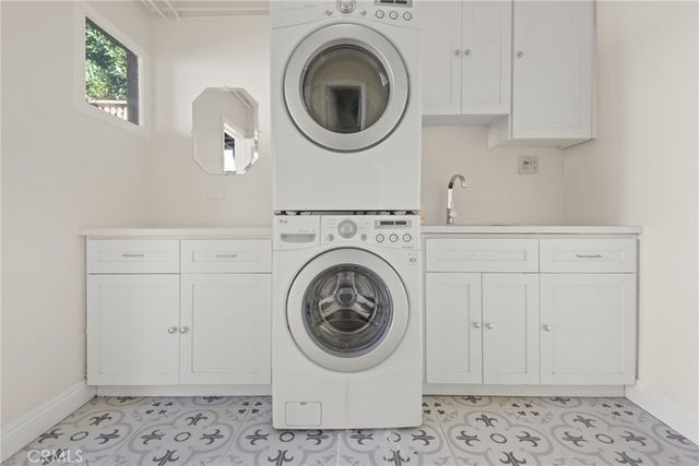 a view of a house with a small yard