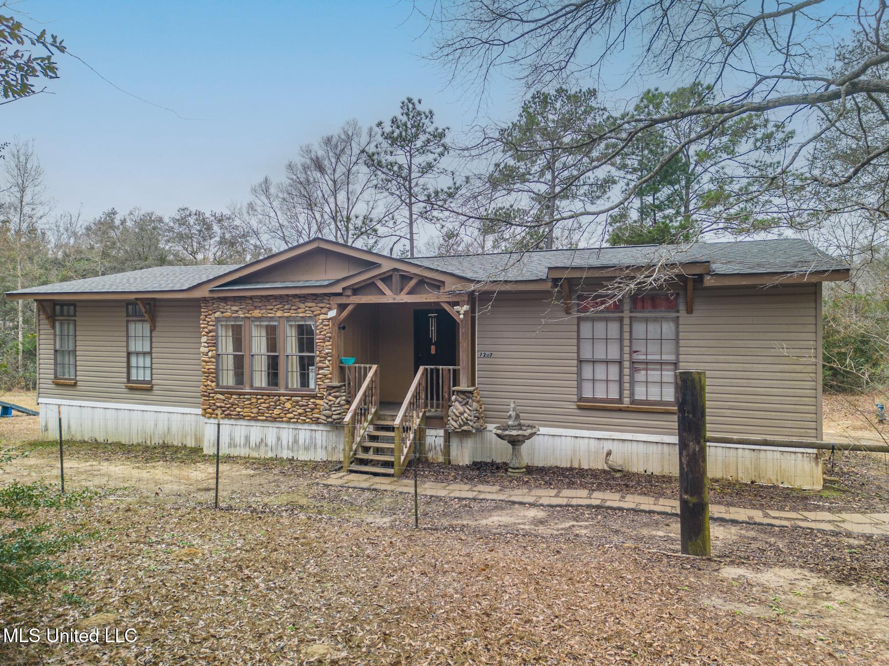 7207 Plantation Road Vancleave, MS 39565 - Photo 1 of 25 front