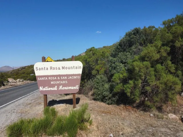 a sign on the side of a road