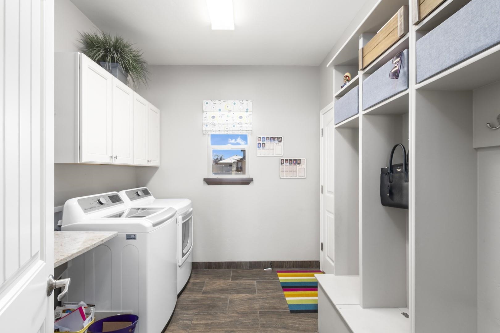 744 Ruby Ranch Drive Grand Junction, CO 81505 - Photo 24 of 33 a storage room with washer and dryer