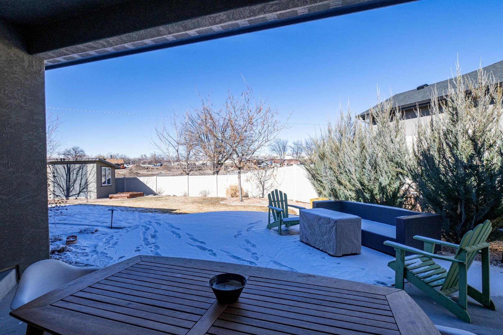 744 Ruby Ranch Drive Grand Junction, CO 81505 - Photo 29 of 33 a view of a balcony with chairs