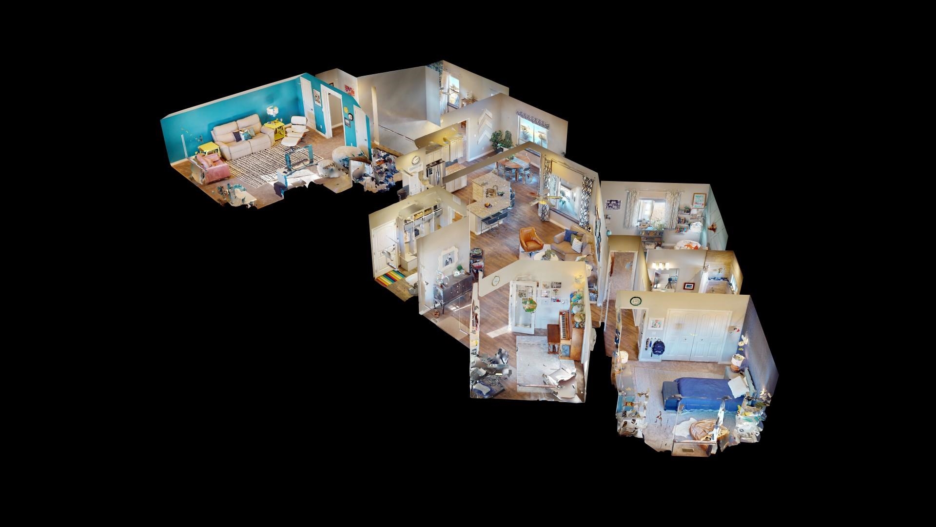 744 Ruby Ranch Drive Grand Junction, CO 81505 - Photo 33 of 33 a picture of a table and a chandelier