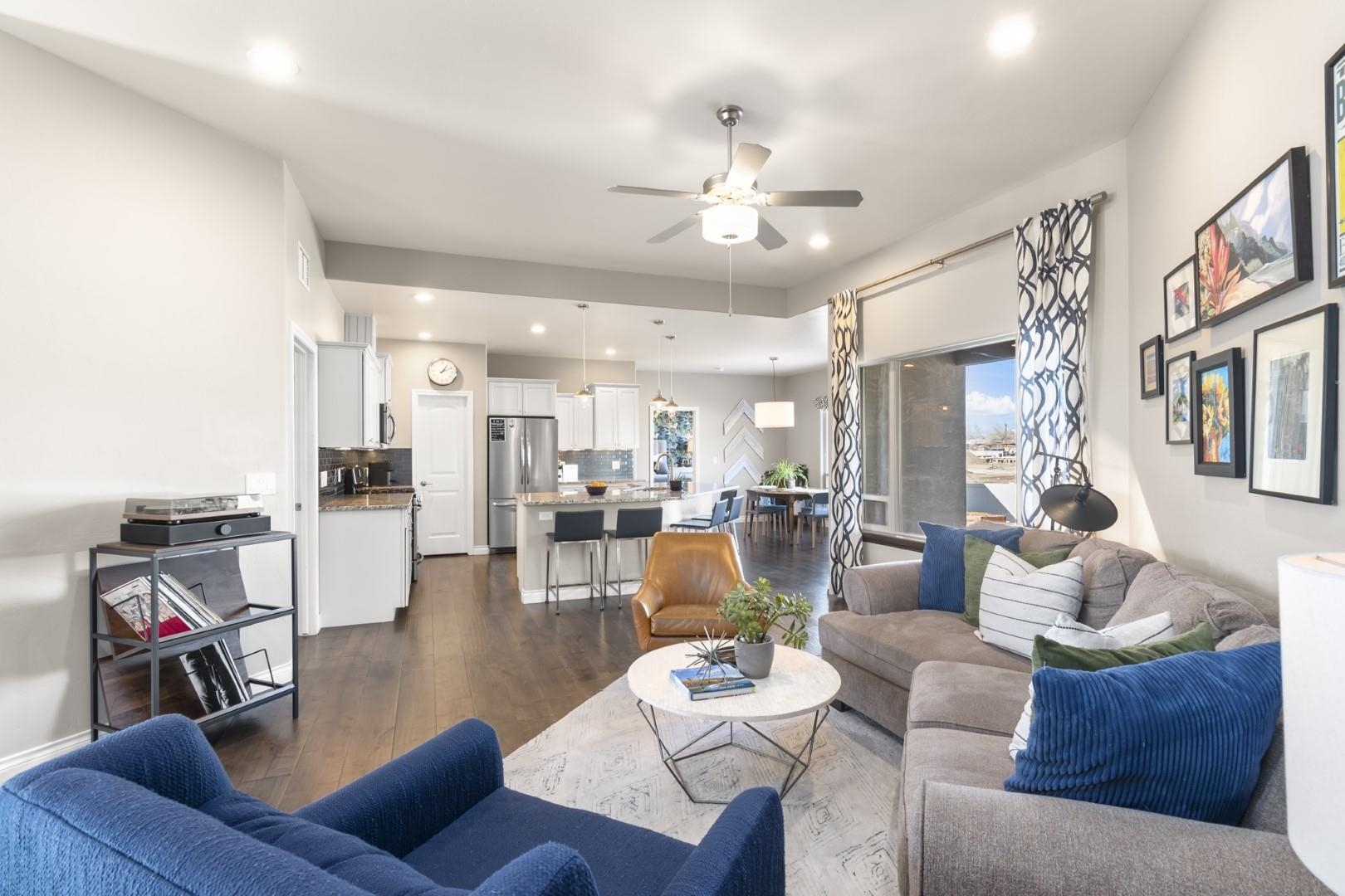 744 Ruby Ranch Drive Grand Junction, CO 81505 - Photo 5 of 33 a living room with furniture and kitchen view
