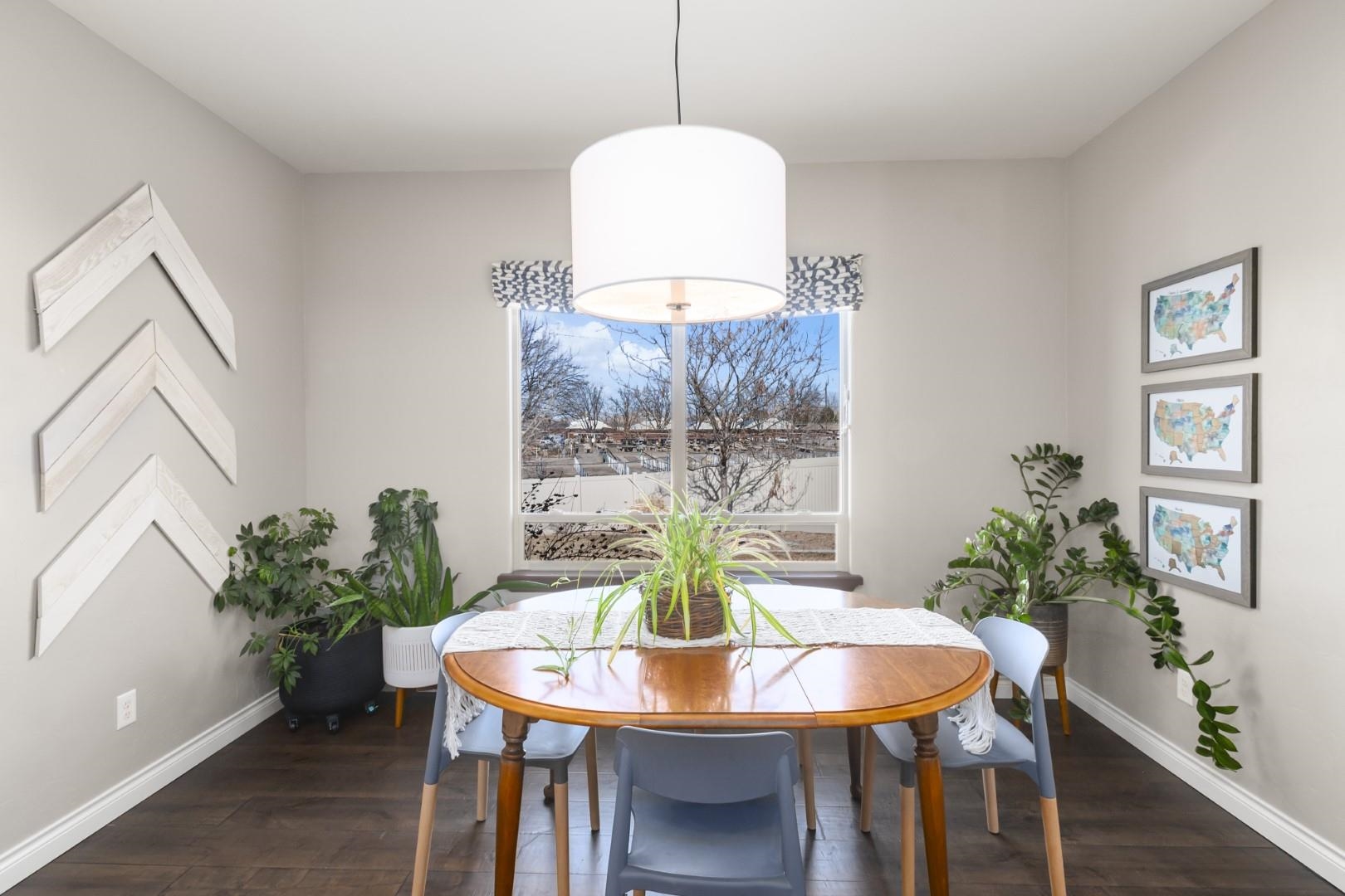 744 Ruby Ranch Drive Grand Junction, CO 81505 - Photo 10 of 33 a dining room with furniture and window